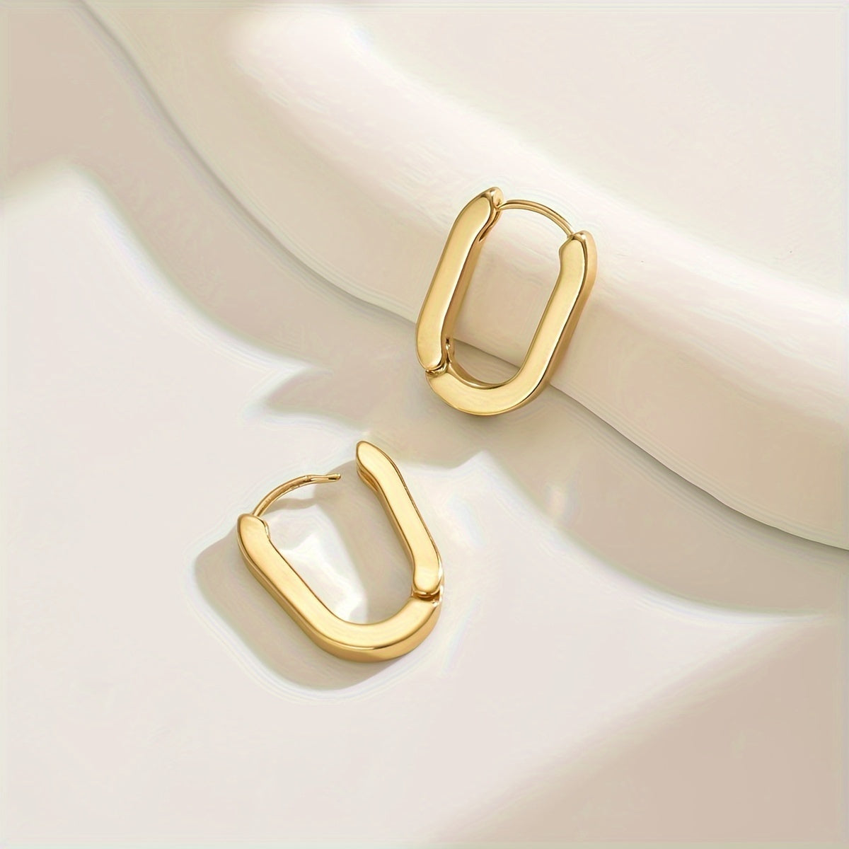 Elegante geometriske hoop øreringe