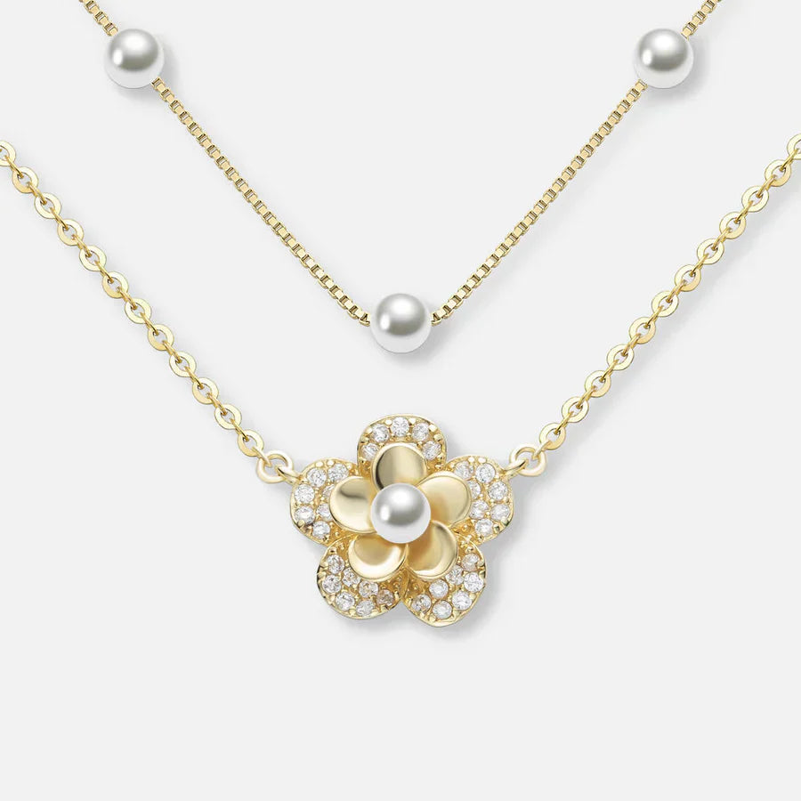 Nederdel med blomster og dobbelt perler