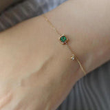 Gul Bracelet med Grøn Krystal