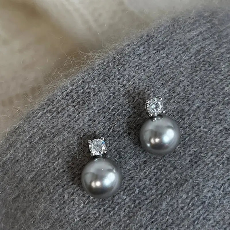 Elegante Øreringe med Sort Perle og Zirkon