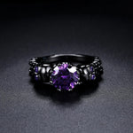 Vintage Czarny Ring med Rund Lilla Ædelsten og Elegant Mønster